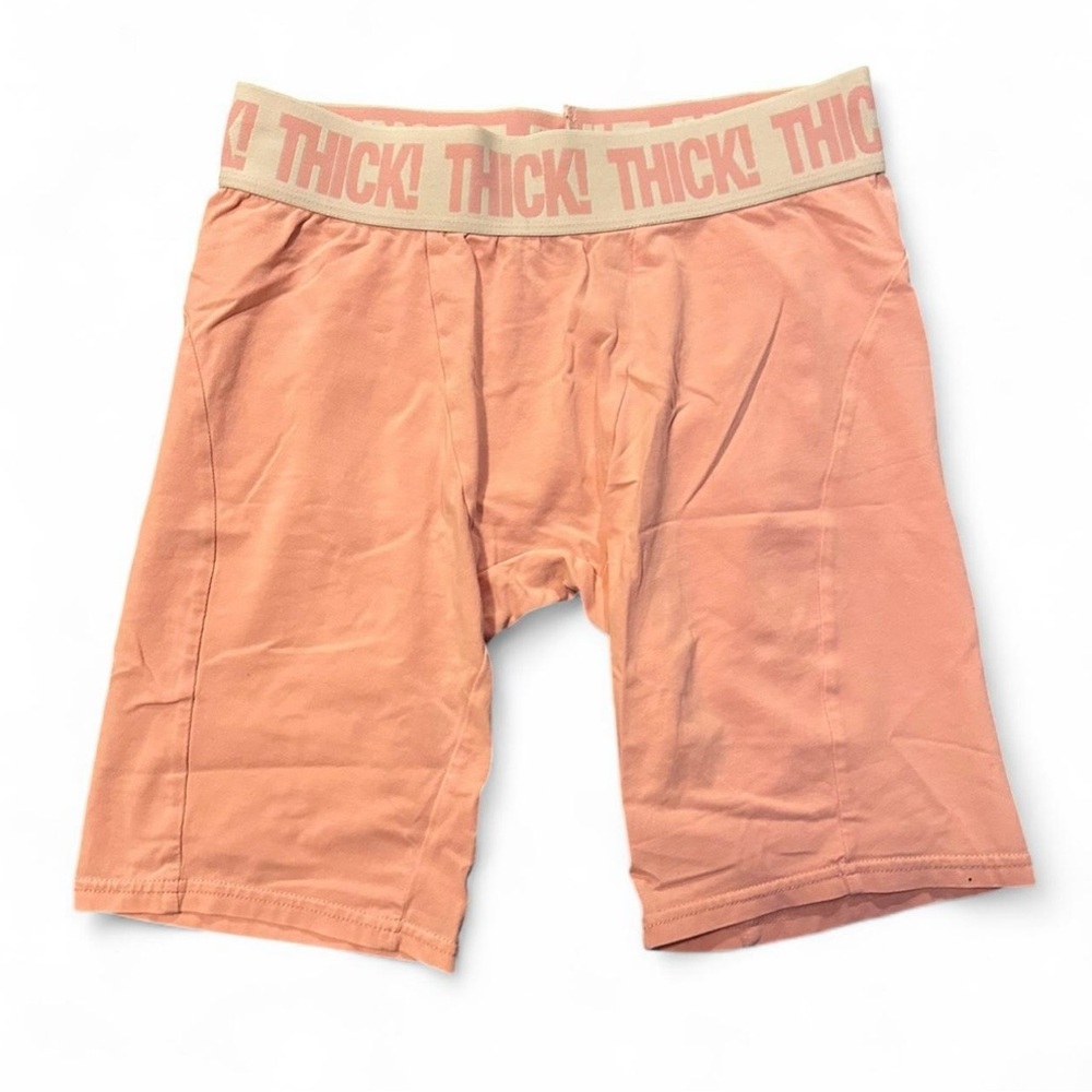 the kylie shop pink “thick” high-waisted biker shorts